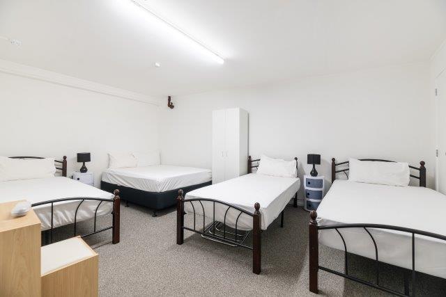 Family room with Queen and three single beds